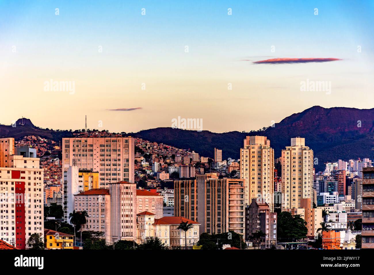 City of Belo Horizonte in the state of Minas Gerais during sunset with its buildings illuminated by the sun Stock Photo