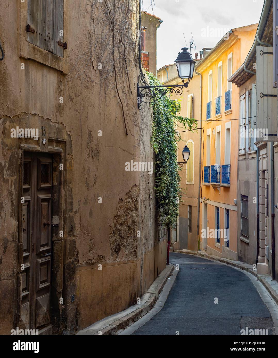 Narrow old town street view. Bеziers, France Stock Photo