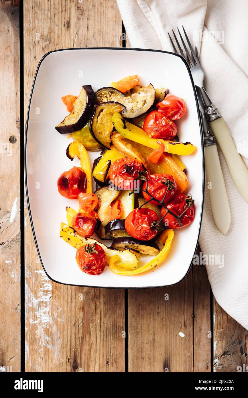 Salad with roasted tomatoes, eggplants, zucchini, bell peppers Stock