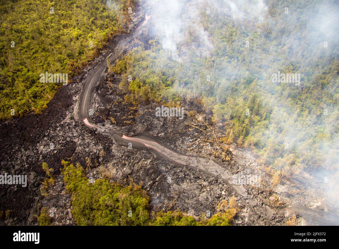 Lava Finger that has broken away from the edge an erupting flow field. P?hoa Village Road / Highway 130. Hawaii. Credit USGS Stock Photo