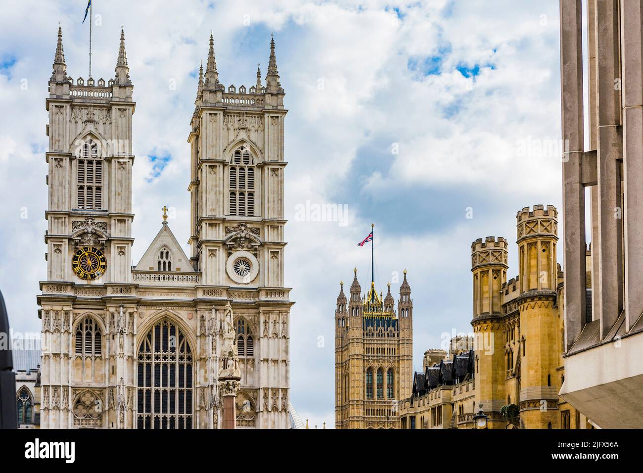 Western facade. Westminster Abbey, formally titled the Collegiate Church of Saint Peter at Westminster, is a large, mainly Gothic abbey church in the Stock Photo