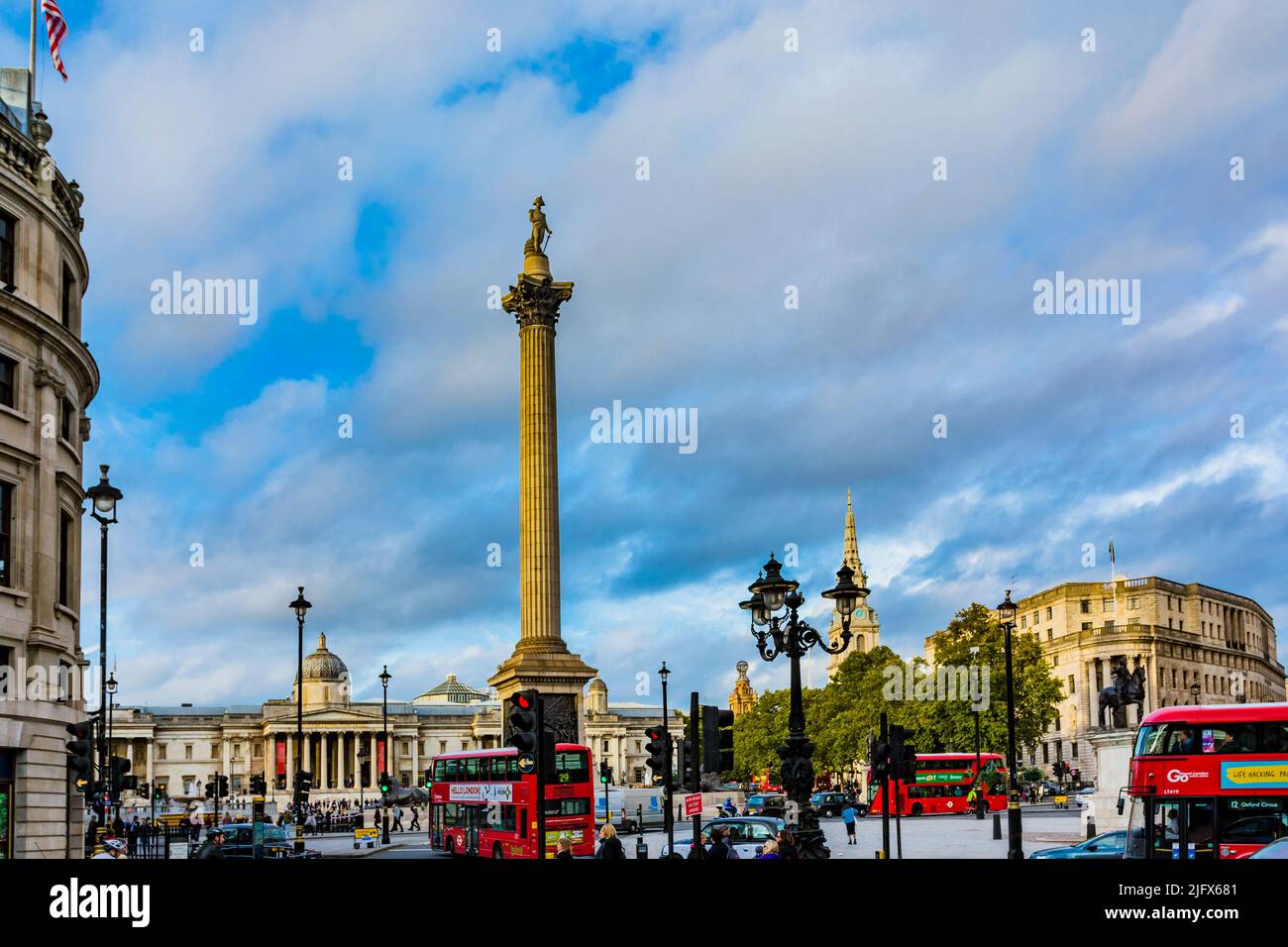 Nelson's Column. Trafalgar Square is a public square in the City of Westminster, Central London, established in the early 19th century around the area Stock Photo