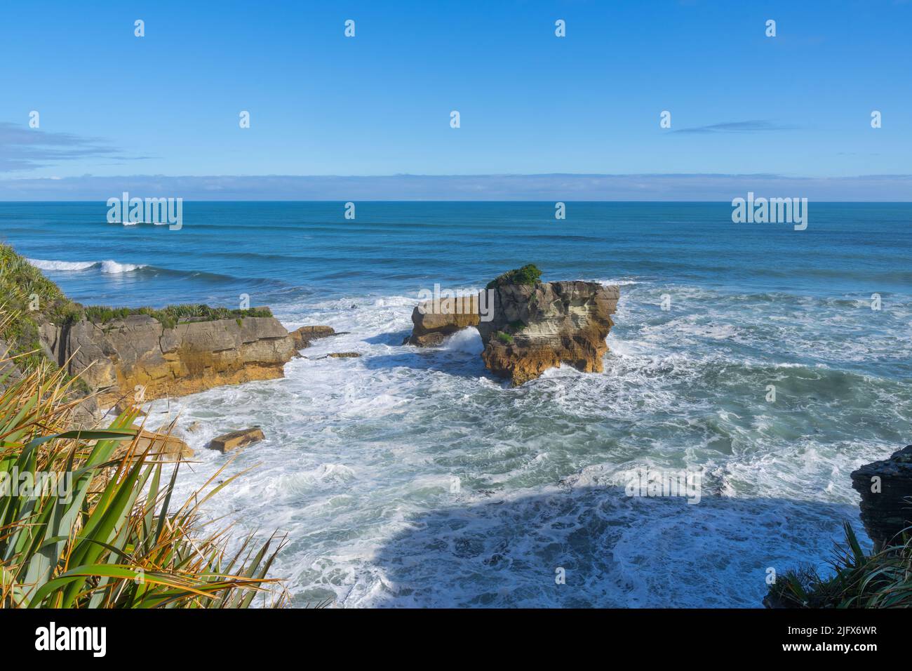 Off Shore Rocks Eroded and weathered off-shore rocks of Punakaiki on West Coast of ...