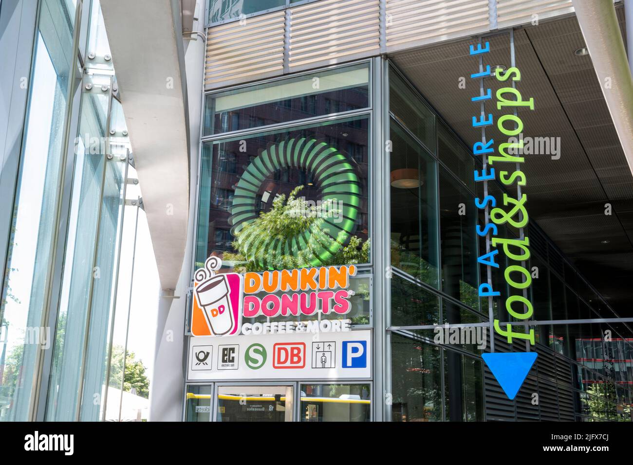 Dunkin Donuts and Passerelle sign at Potsdamer Platz in Berlin, Germany