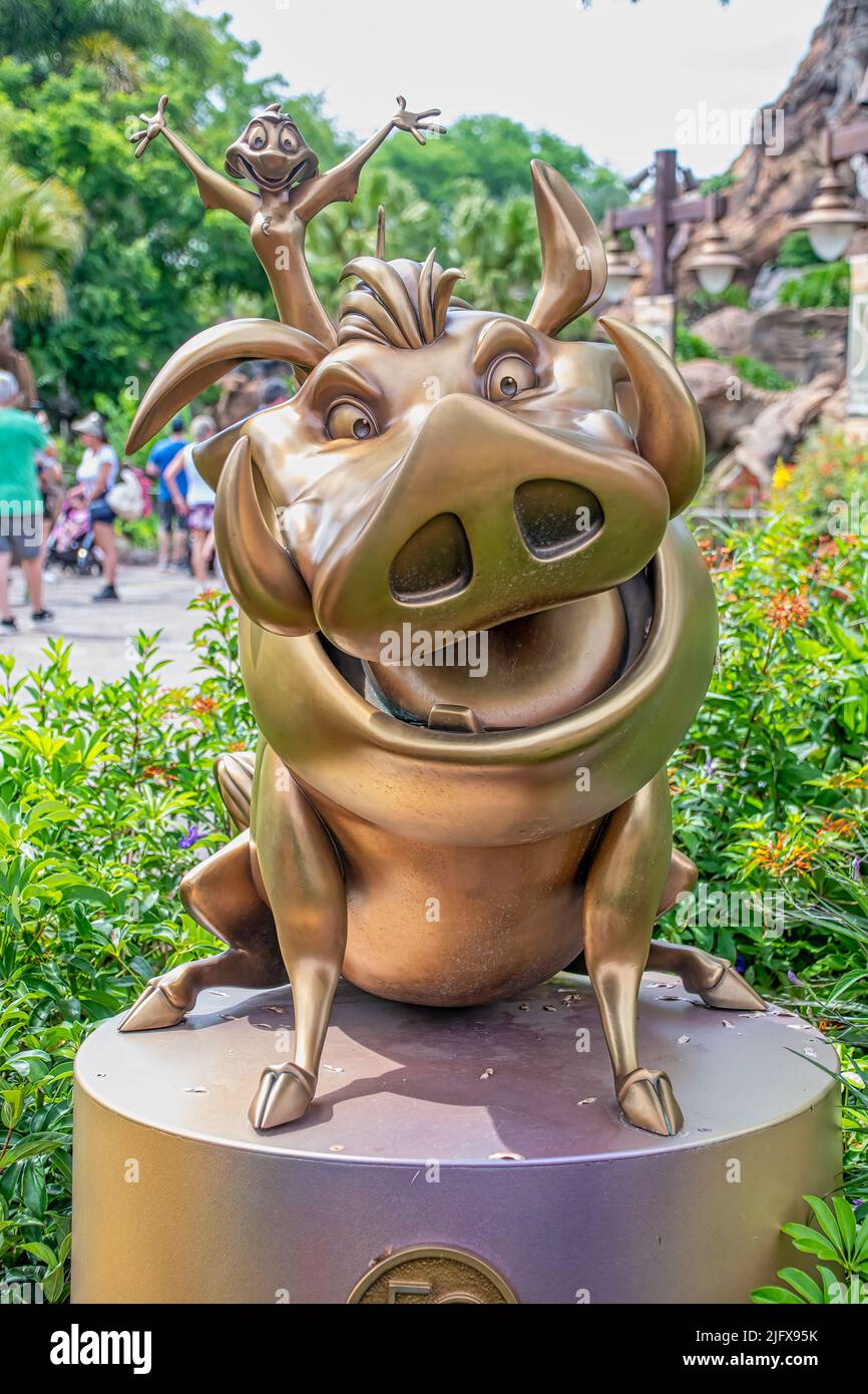 Timon and Pumbaa Gold Statue 50th Anniversary Disney Animal Kingdom Stock Photo