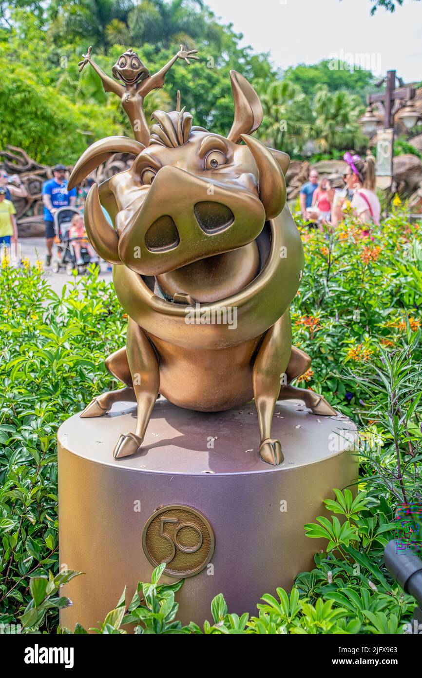 Timon and Pumbaa Gold Statue 50th Anniversary Disney Animal Kingdom Stock Photo