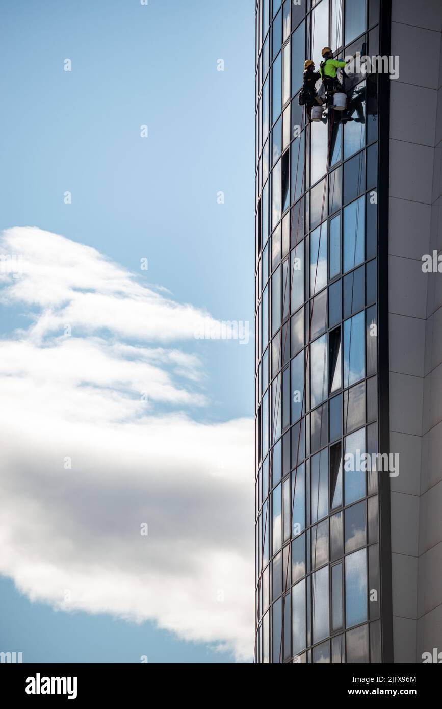 Windows cleaners in Narvik, Norway Stock Photo