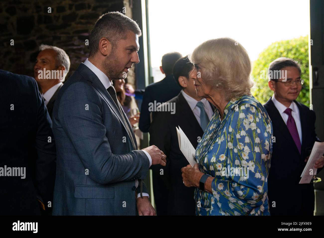 The Duchess of Cornwall speaks to Deputy Head of Mission at the