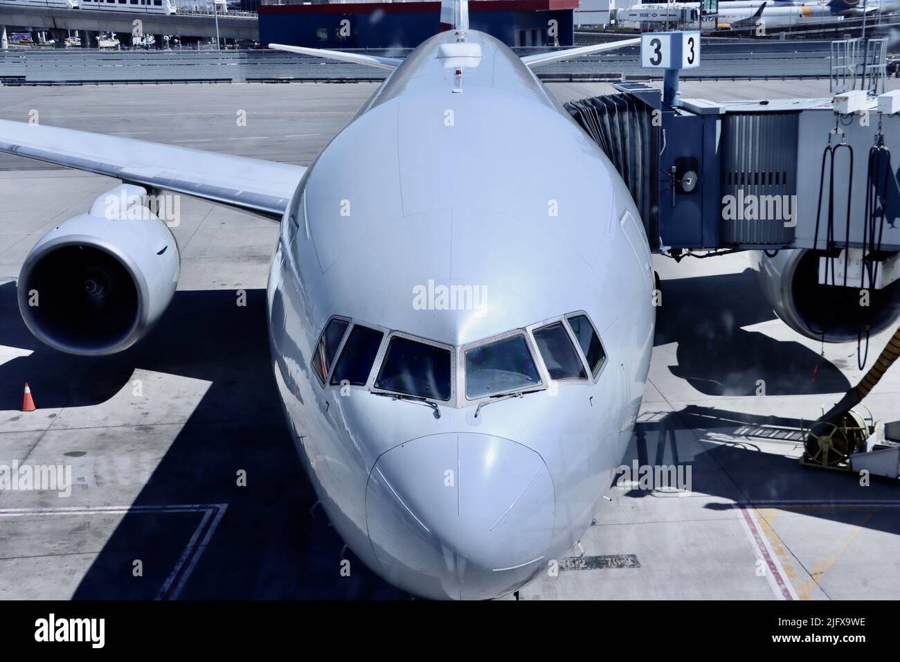 Airline parked at gate at JFK airport on June 6th 2022 Stock Photo
