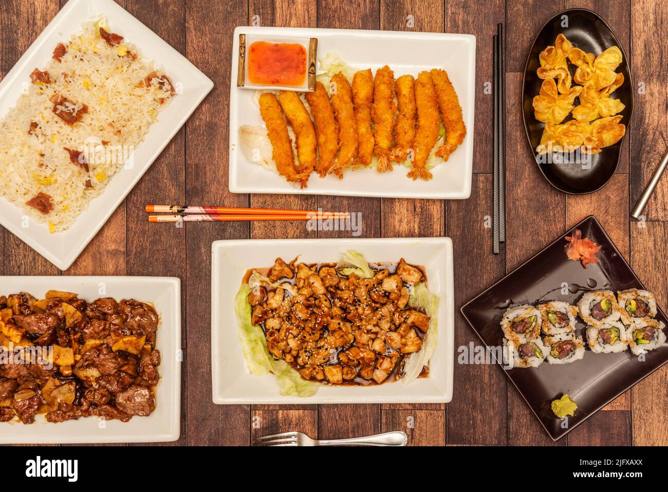 Set of oriental food dishes with panko battered shrimp, fried wonton