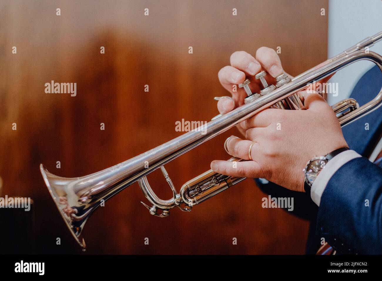 A shallow focus shot of a person playing the tube Stock Photo Alamy