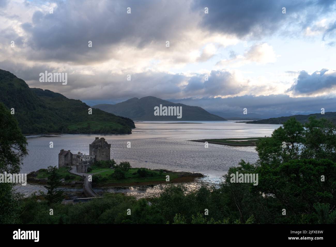 Looking over Eilean Donan Castle to the West on Loch Duich and Loch Alsh at Dusk Stock Photo
