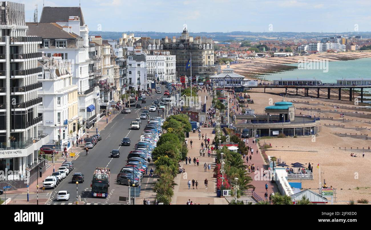 A SUNNY VIEW OF THE SEAFRONT IN THE SUSSEX SEASIDE HOLIDAY RESORT OF EASTBOURNE Stock Photo
