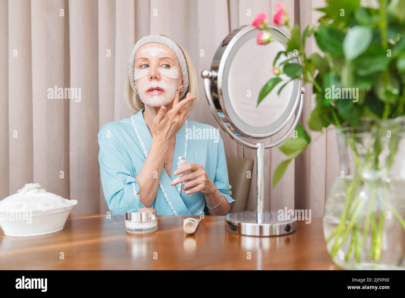 Woman uses moisturizing mask hi-res stock photography and images - Alamy