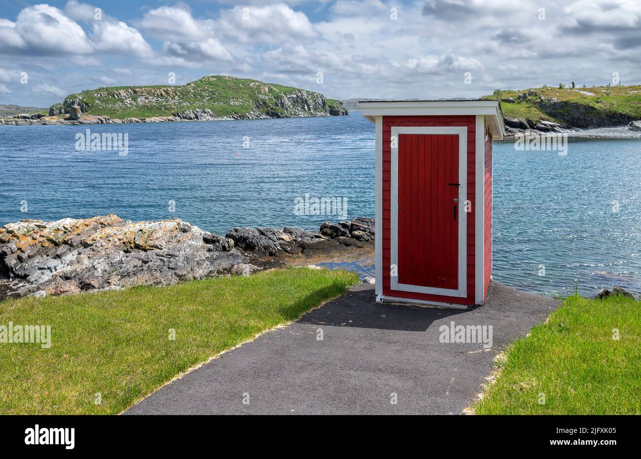 Outhouse at Bay Roberts with Fergus Island in the background Stock Photo
