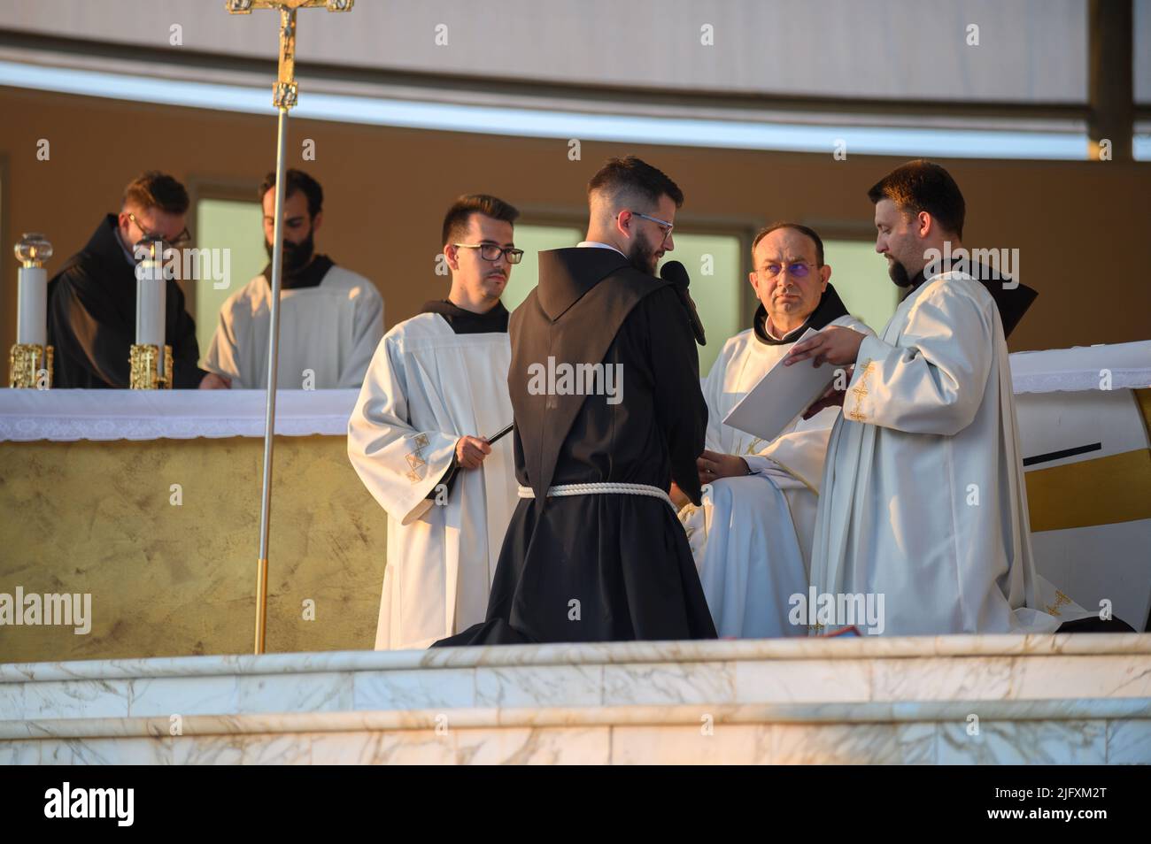 Profession of vows by six brothers of the Franciscan Province of Herzegovina during the evening Holy Mass in Medjugorje on 4 September 2021. Stock Photo