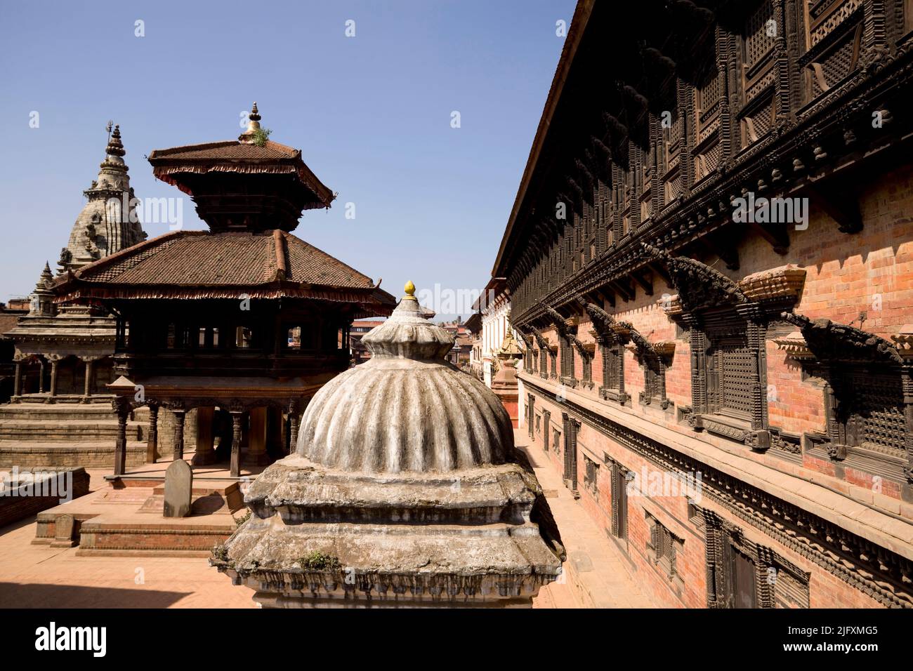 Bhaktapur is an ancient Newar town in the east corner of the Kathmandu Valley, Nepal. It is located in Bhaktapur District in the Bagmati Zone. Durbar Stock Photo