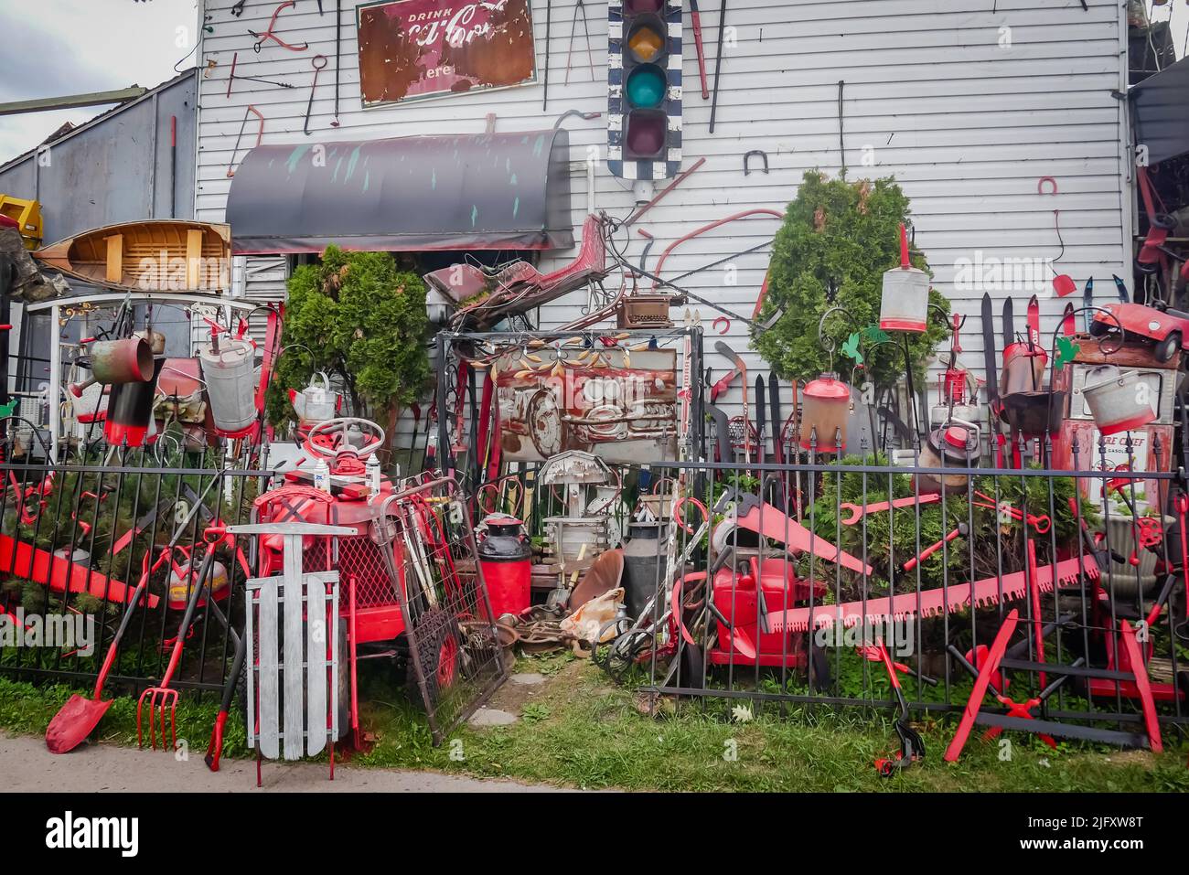 Crazy house, decorated with repurposed junk, by artist Dan Seguin, on Casseels Street, North Bay, Ontario, Canada Stock Photo