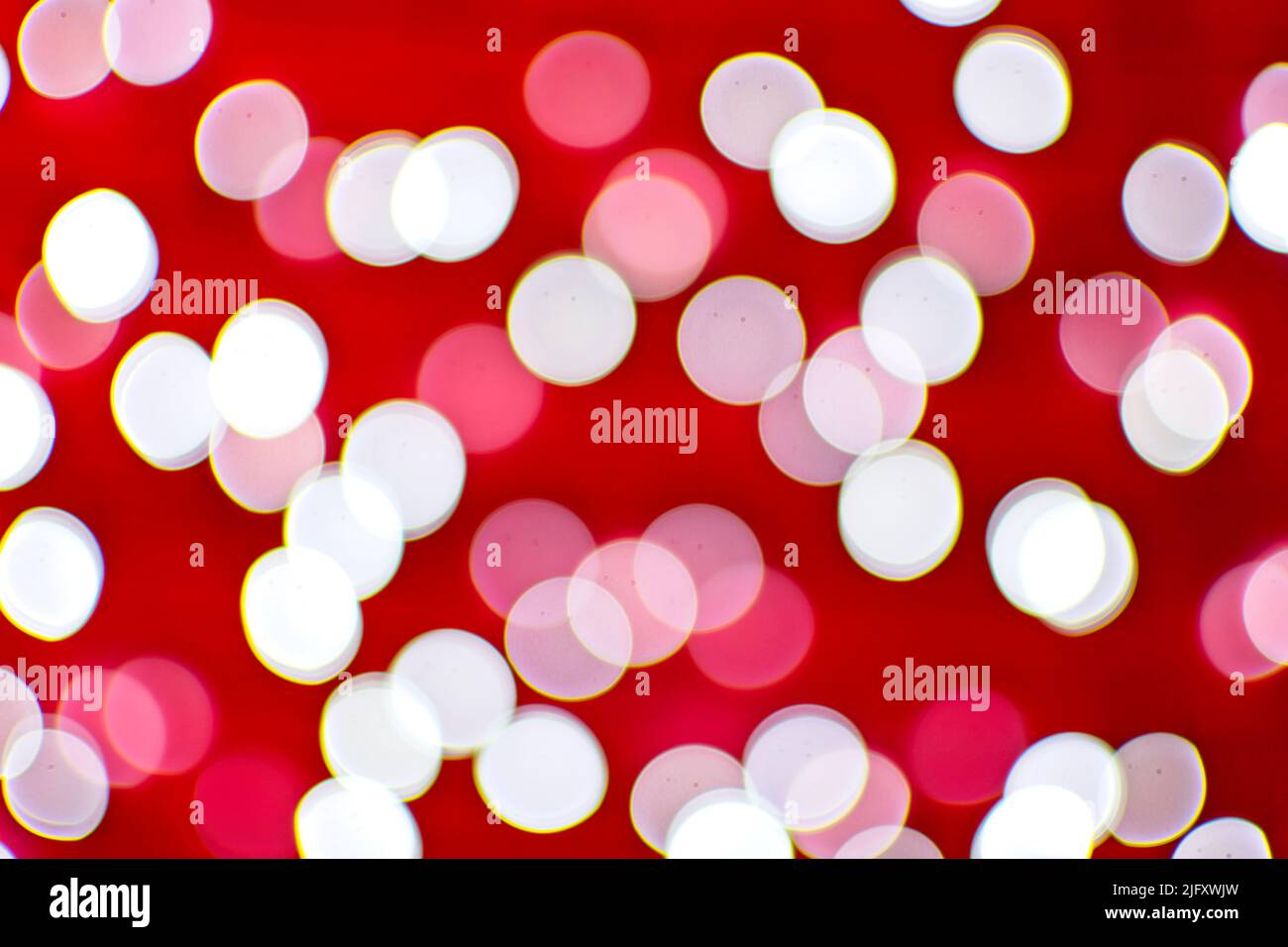 Background image with red and white bokeh lights. Stock Photo