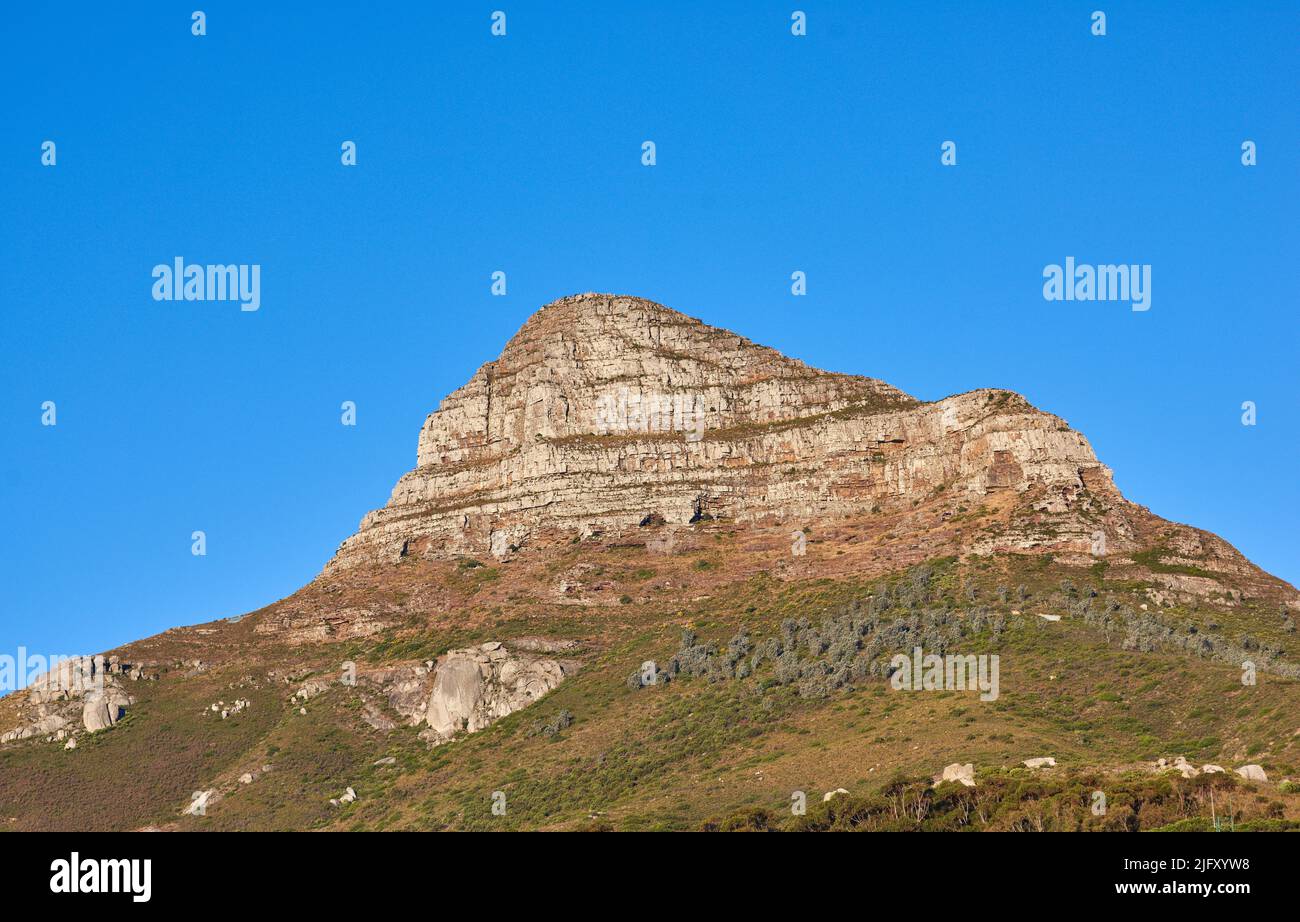 scenic landscape view of Lions Head in Cape Town, South Africa against a clear blue sky background from below with copyspace. Beautiful panoramic of Stock Photo