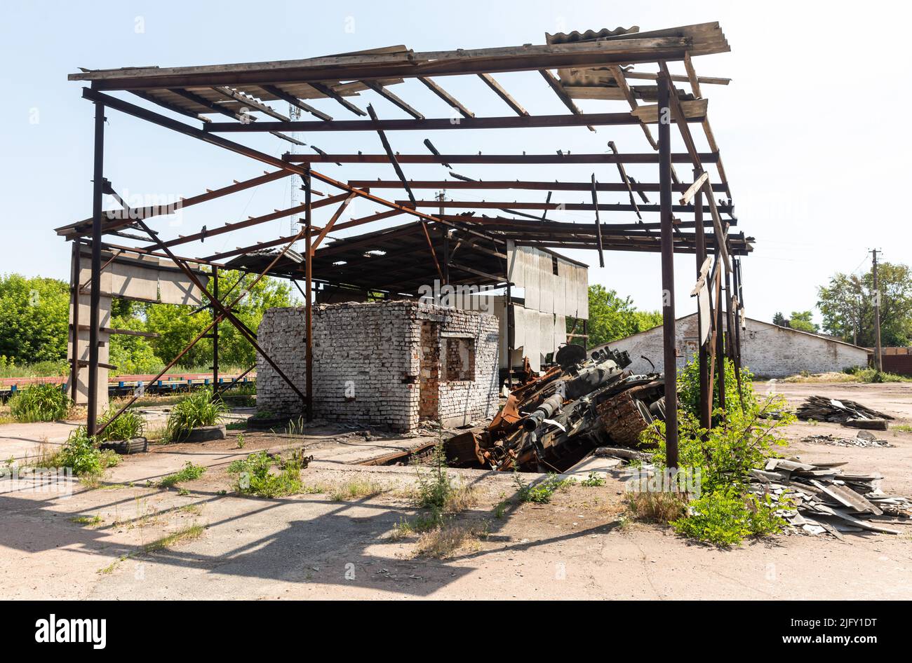Destroyed Technical A view of a burnt and destroyed tank at a technical building destroyed ...
