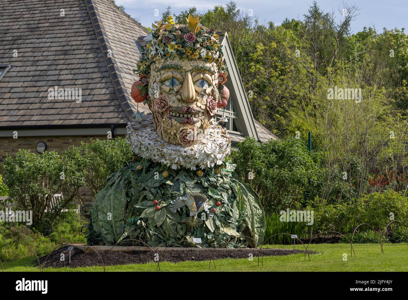 Four Seasons sculptures by American artist Philip Haas called changing season. A collection of seasonal vegetables at RHS Royal horticultural society. Stock Photo