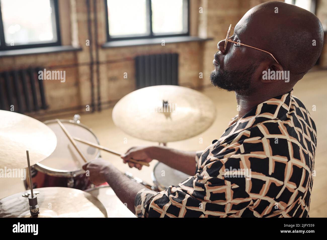 African american guy playing drums hi-res stock photography and images ...