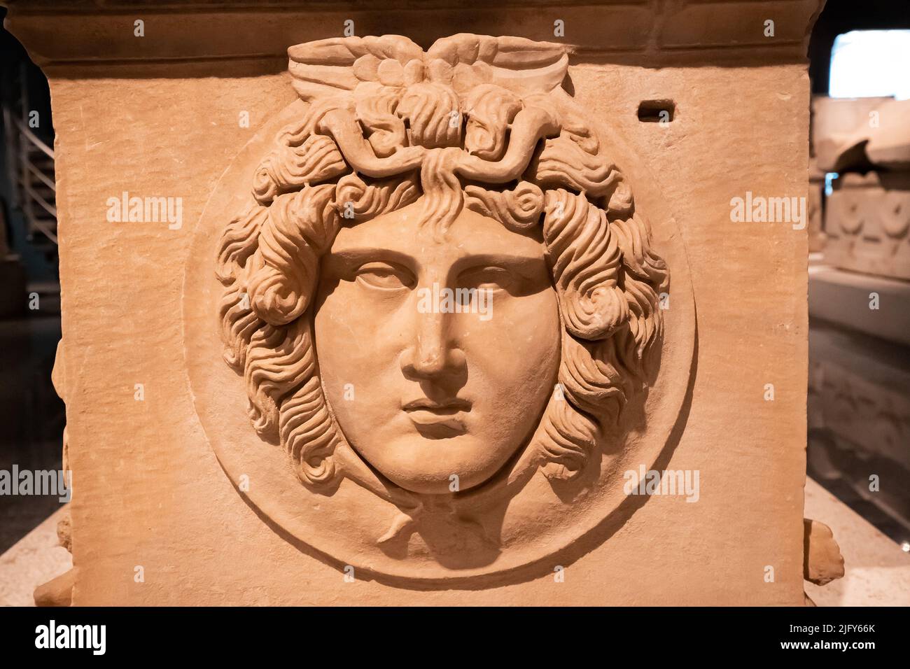 Basrelief carved on an ancient Lycian sarcophagus or tomb with the