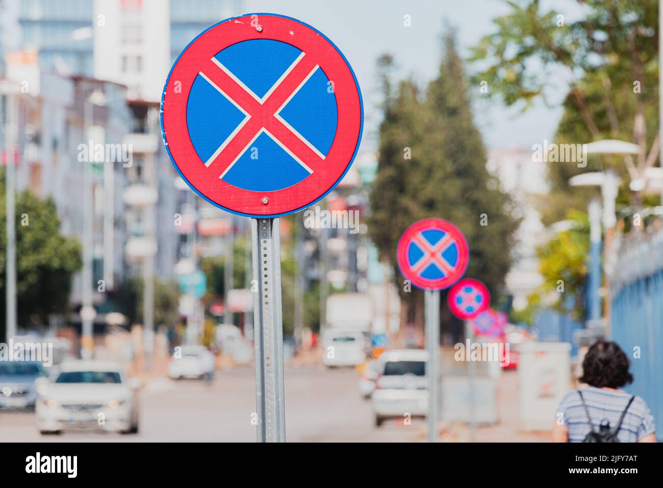 Many Road signs prohibiting parking and stopping. Traffic laws and ...