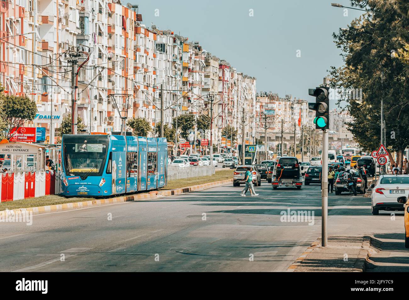 30 May 2022, Antalya, Turkey: Modern Antray Tram and green traffic ...