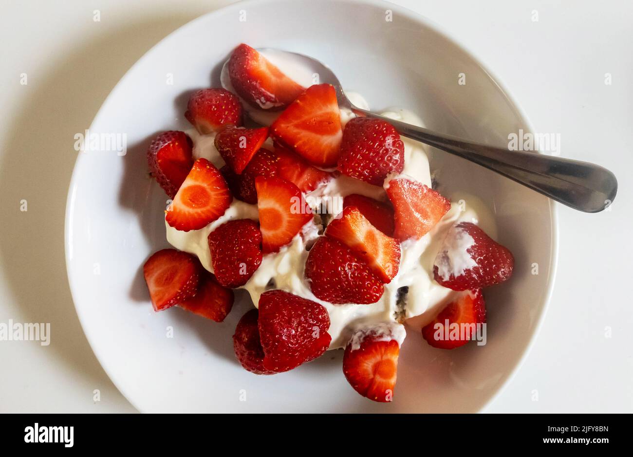 Strawberries and yogurt Stock Photo