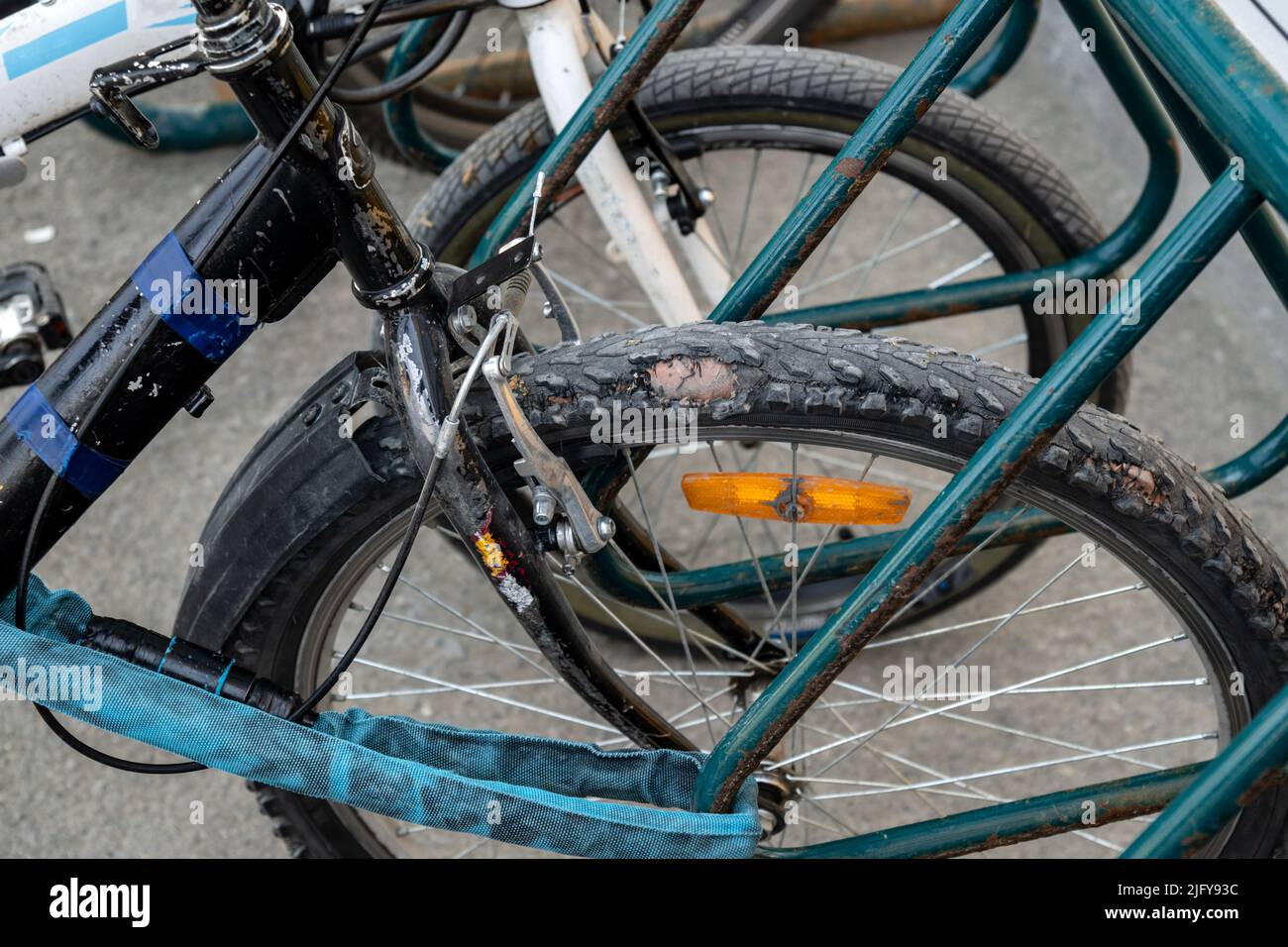 Old worn out bicycle tire. Replacing the tube on the wheel of a