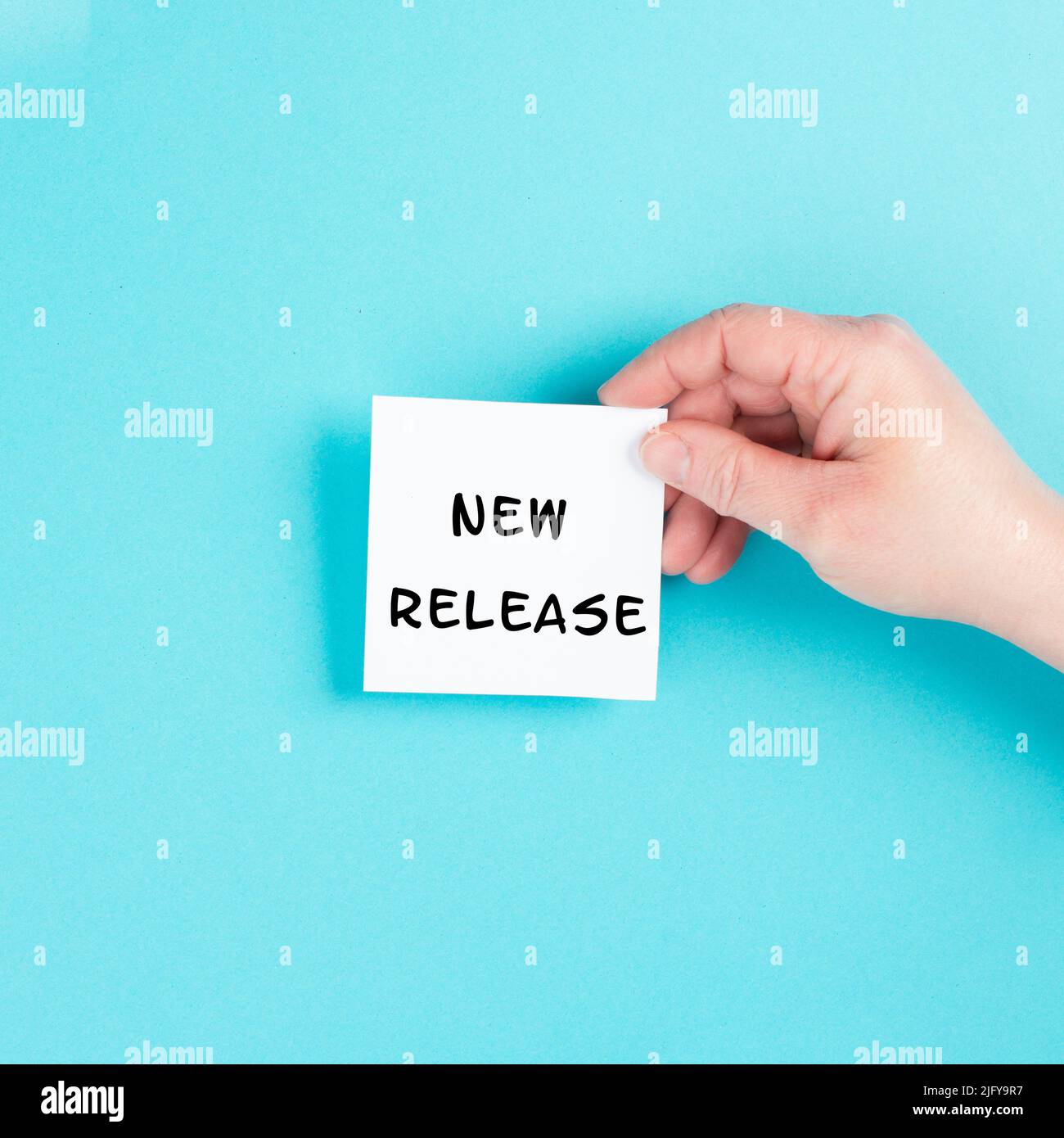 The words new release are standing on a paper, publishing and