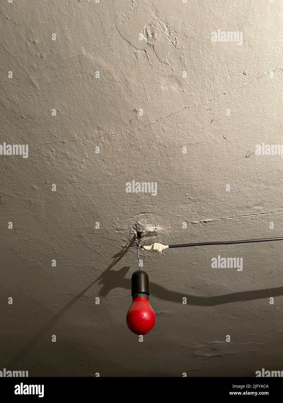 Red light in the dark room Stock Photo Alamy