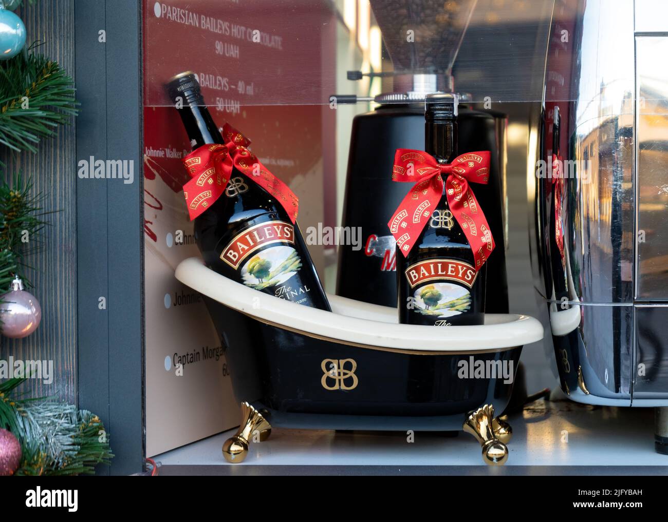 Two Baileys bottles. Alcoholic liquor for Christmas and holidays. Street fair. Ukraine, Kyiv - December 1, 2021 Stock Photo
