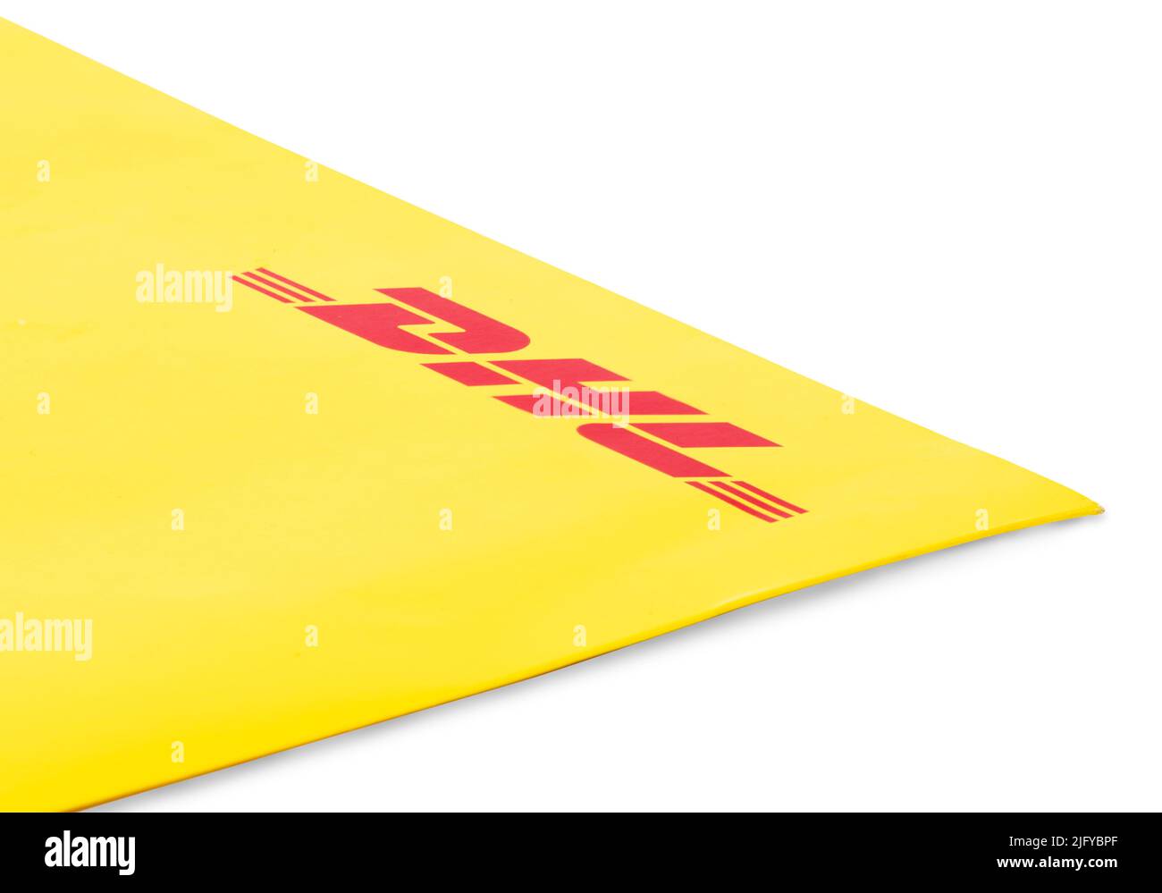 03 June 2022, Antalya, Turkey DHL express delivery postal envelope on