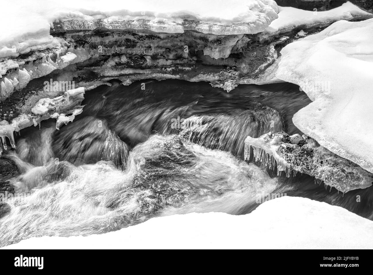 A winter river in Colorado with melting snow Stock Photo