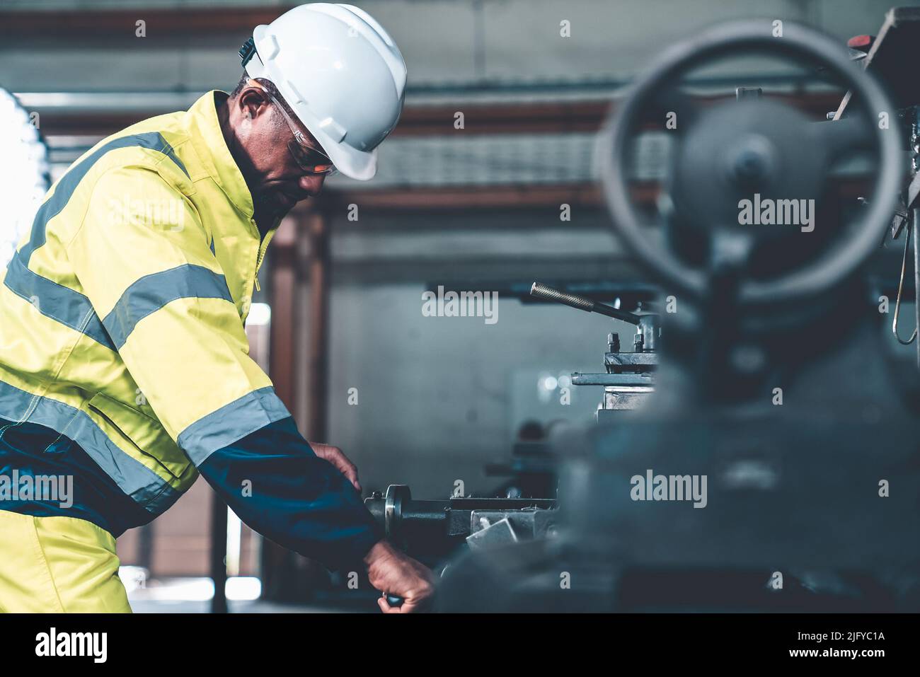 Factory worker or engineer do machine job in adept manufacturing . Industrial people