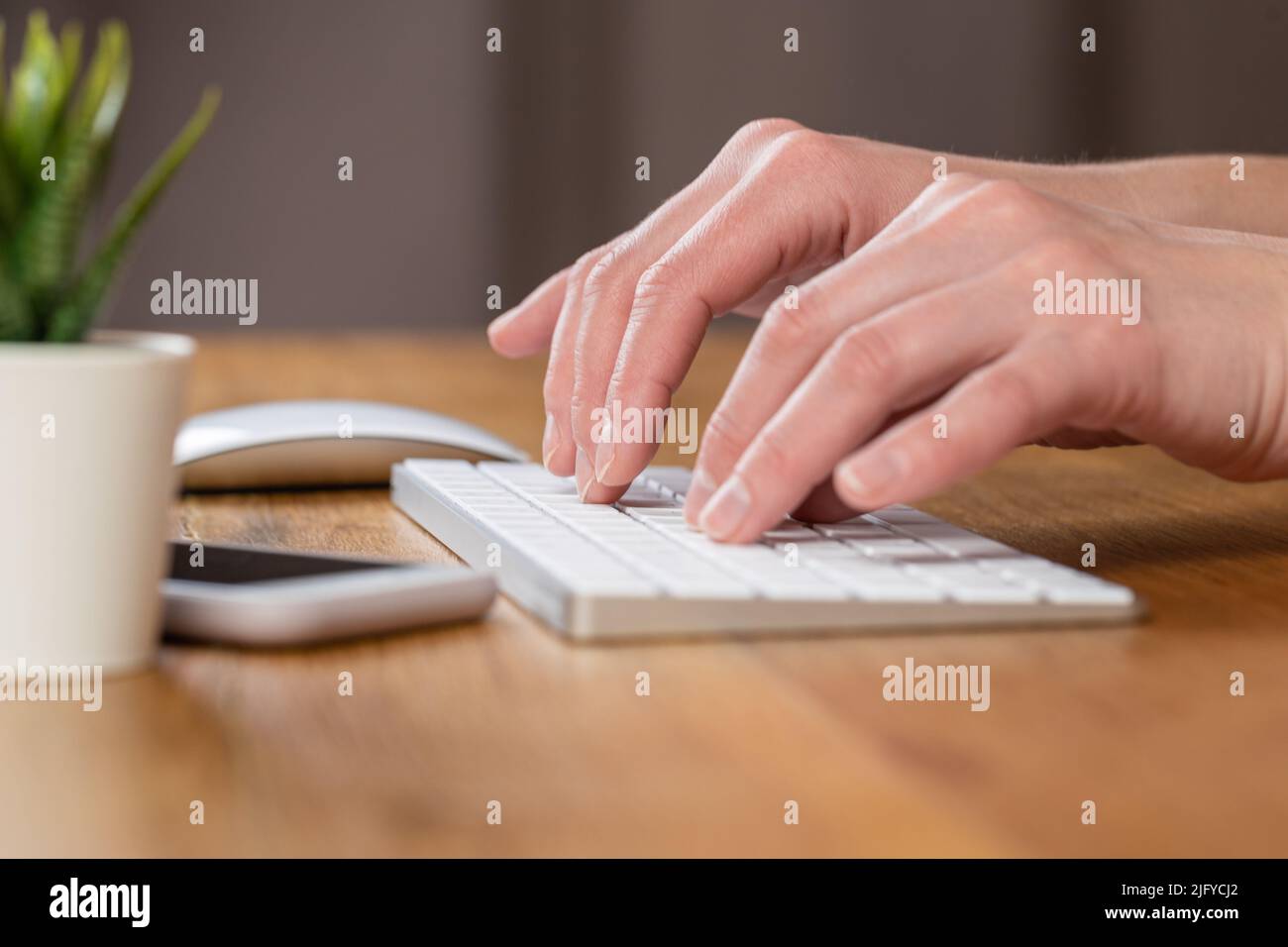 Woman typing keyboard white hi-res stock photography and images - Alamy