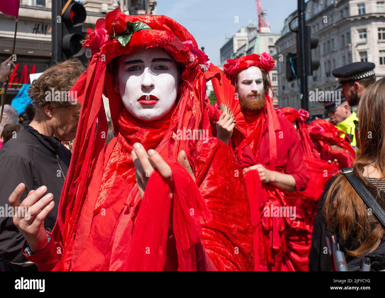 The Red Brigade at the Extinction Rebellion demonstration, at Oxford Circus, London, in protest of world climate breakdown and ecological collapse. Stock Photo