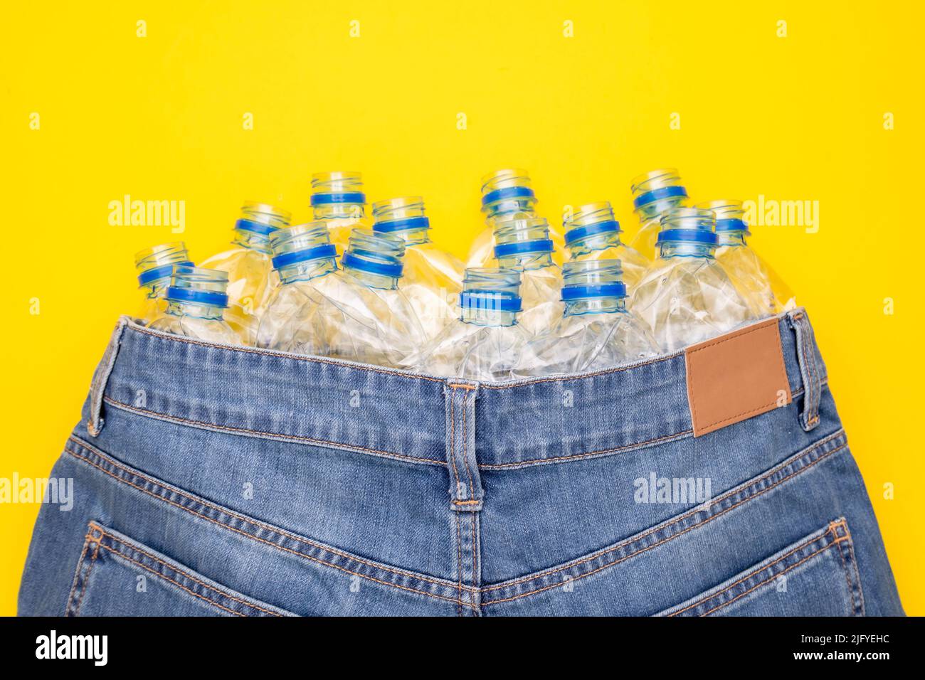 Recycle technology of plastic bottle to make clothes. Top view old