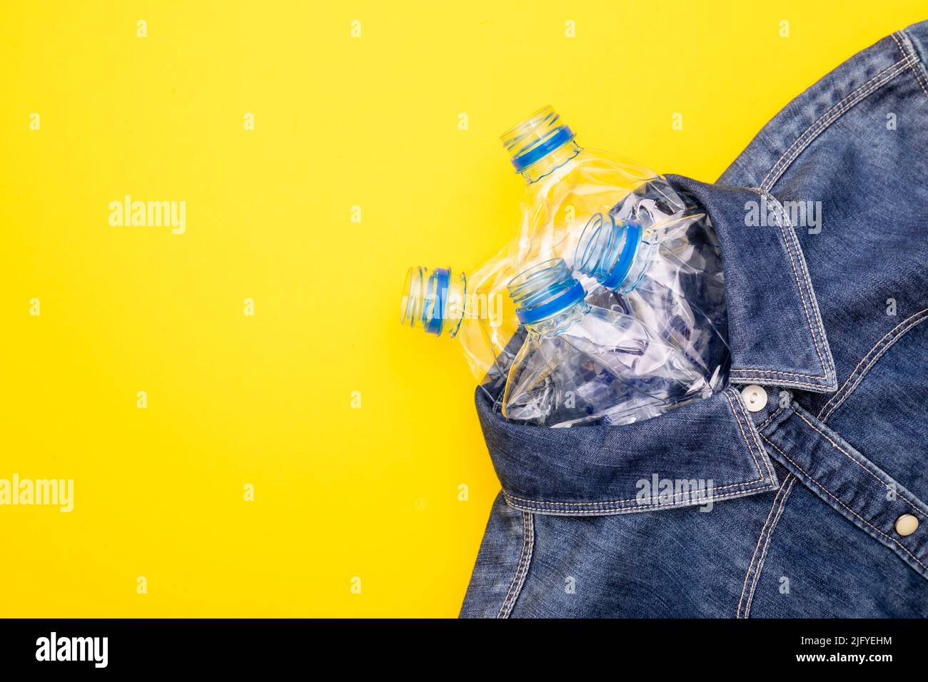 Recycle technology of plastic bottle to make clothes. Top view old