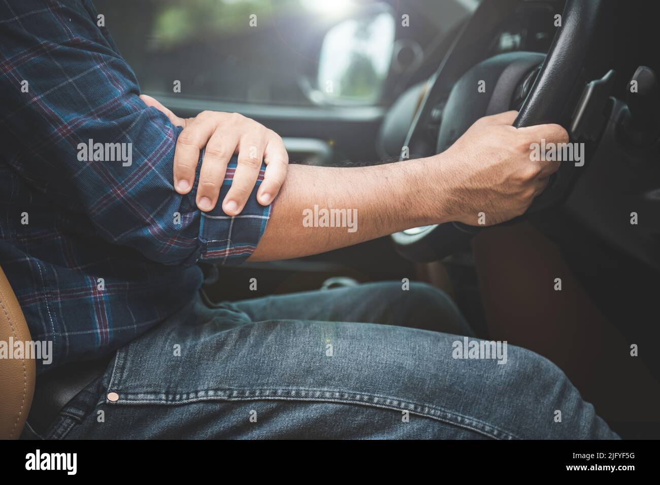 Hand on knee in car hi-res stock photography and images - Alamy
