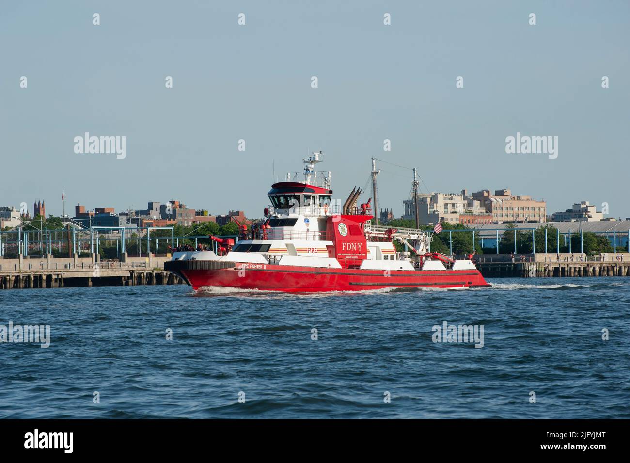 In the runup to the July 4, 2022 fireworks, the FDNY's fireboat, Firefighter II traveled up the East River. Stock Photo