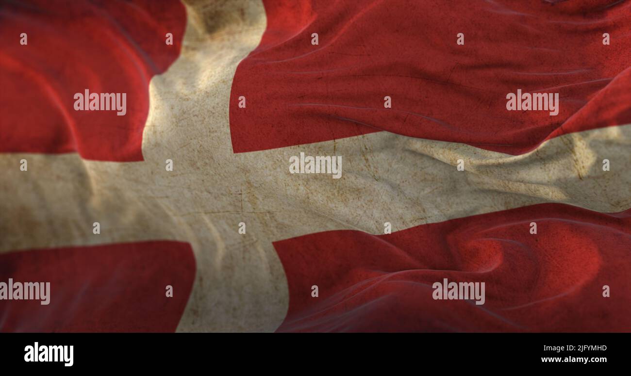 Old Denmark Flag waving at wind Stock Photo