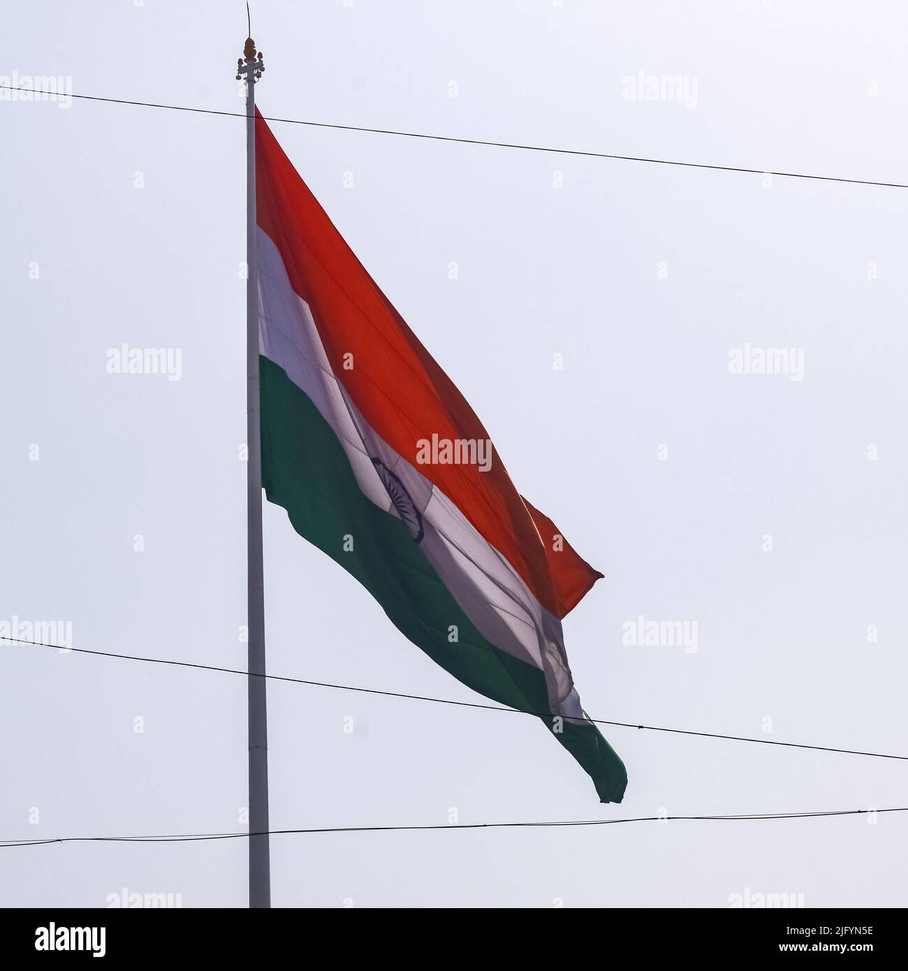 India flag flying high at Connaught Place with pride in blue sky, India ...