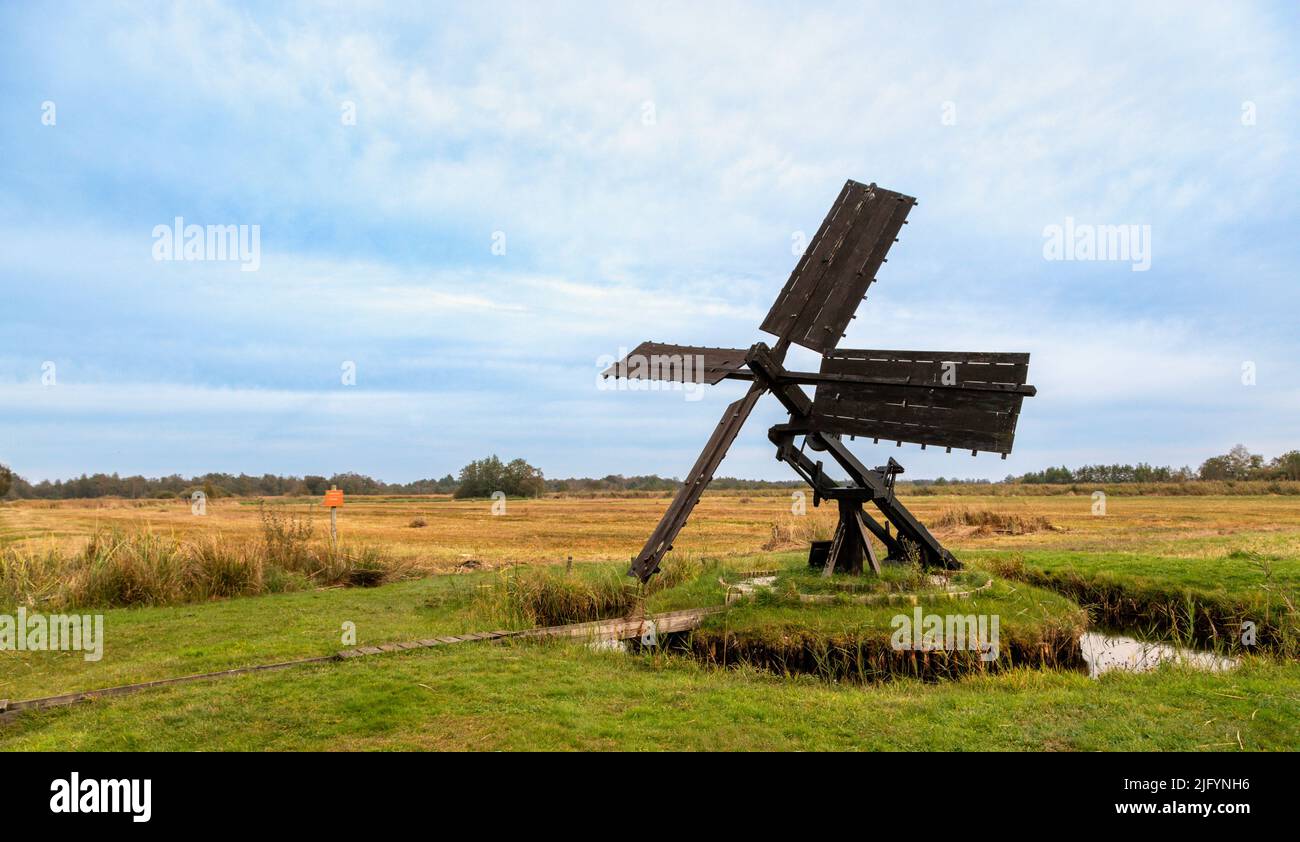 A Tjasker, a small type of windmill used for drainage purposes in the National Park of the Weerribben-Wieden, Overijssel, The Netherlands. Stock Photo