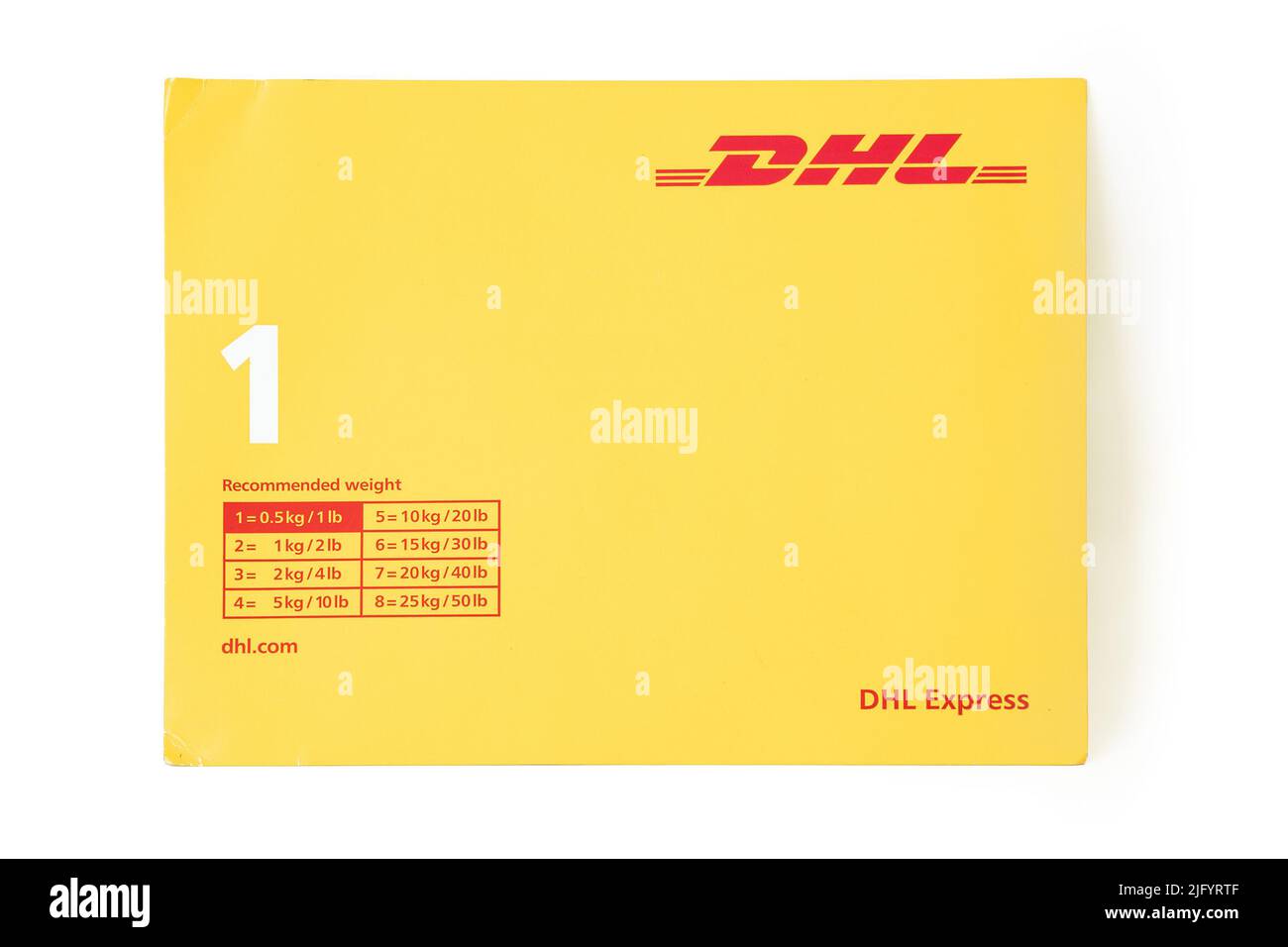 03 June 2022, Antalya, Turkey: DHL express delivery postal envelope on white background. Global Shipping company Stock Photo