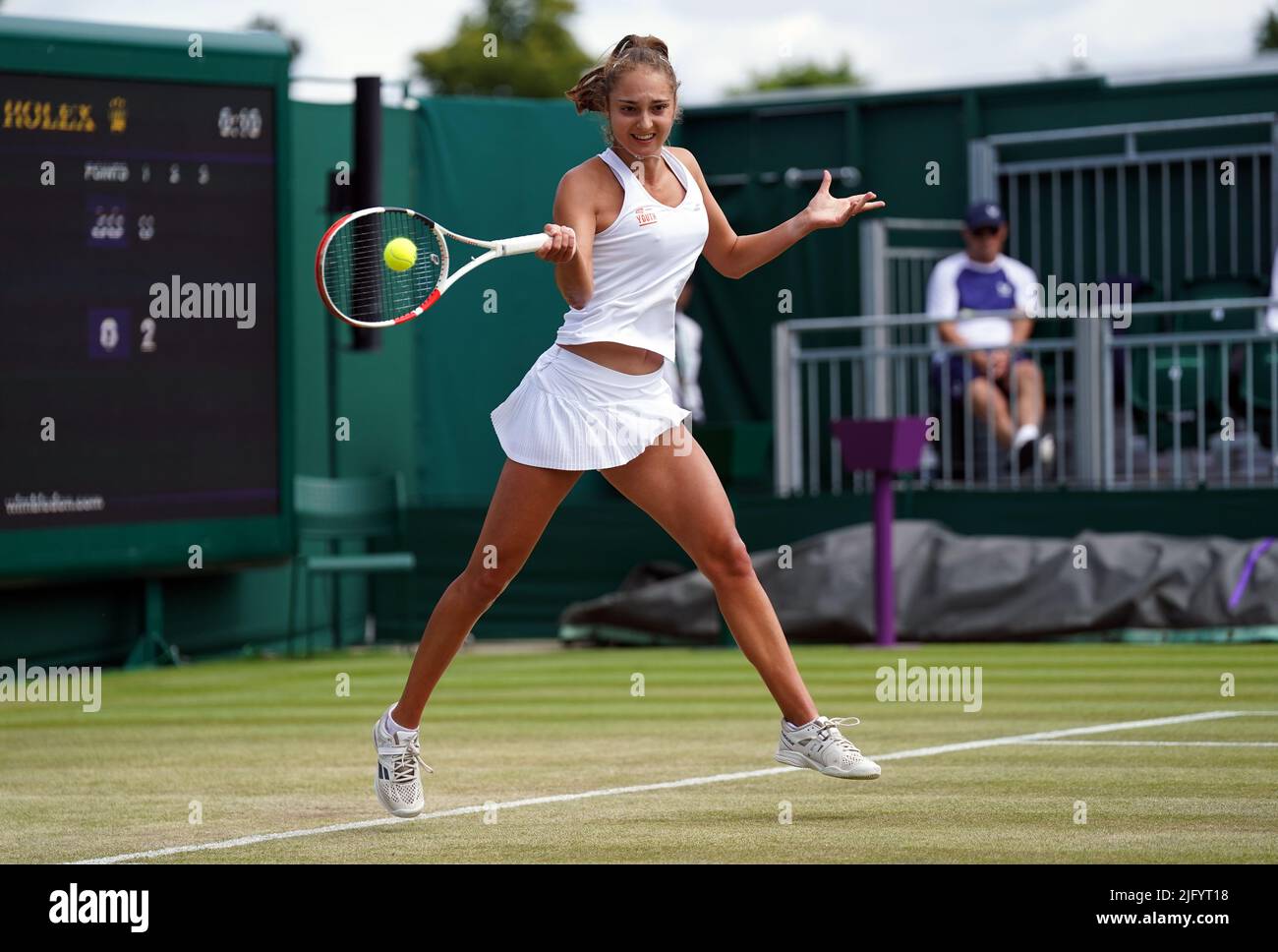 Jasmine Conway in action against Hayu Kinoshita during the gilrs singles on day ten of the 2022 Wimbledon Championships at the All England Lawn Tennis and Croquet Club, Wimbledon