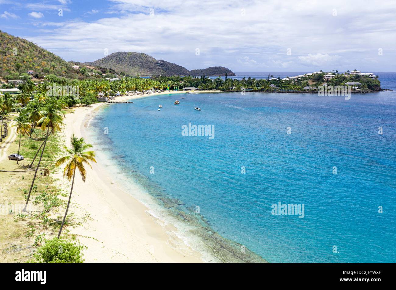 Empty tropical sand beach washed by Caribbean Sea, Morris Bay, Antigua, West Indies, Caribbean, Central America Stock Photo